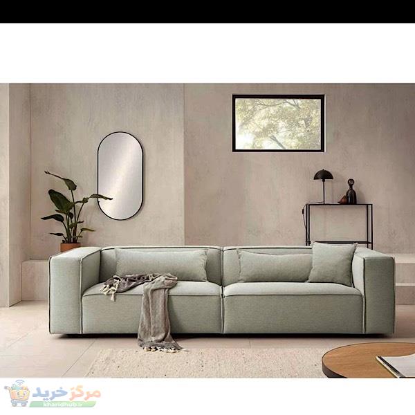 مبل راحتی سه نفره با روکش پارچه و پایه چوب مدل تینا  به همراه 4 کوسن